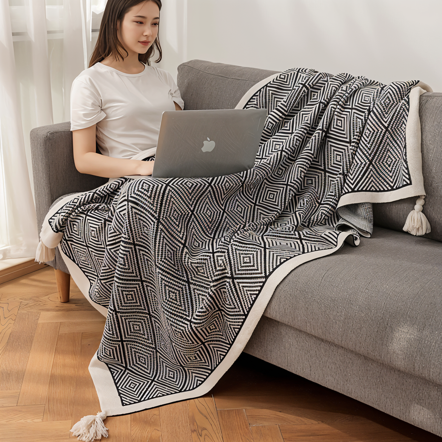 Geometrische Fleece-Decke in Schwarz-Weiß