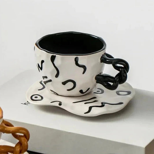 Handbemalte Frühstückstasse und Untertasse aus Keramik