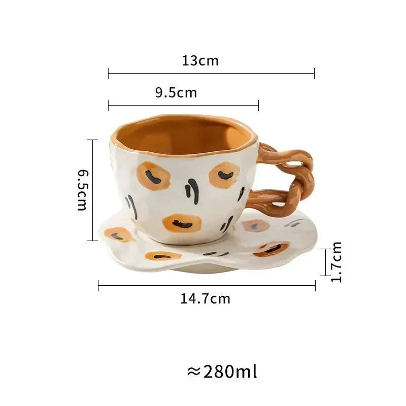 Handbemalte Frühstückstasse und Untertasse aus Keramik